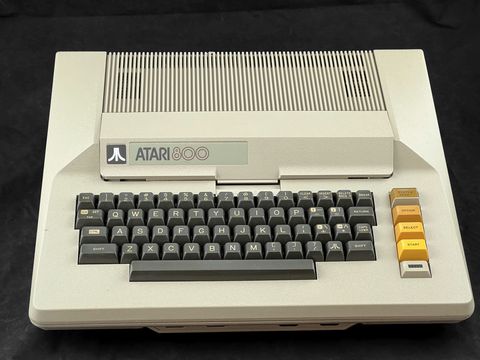 Atari 800 computer from the front and slightly above, ATARI 800 badge and keyboard clearly visible; no other items in the frame